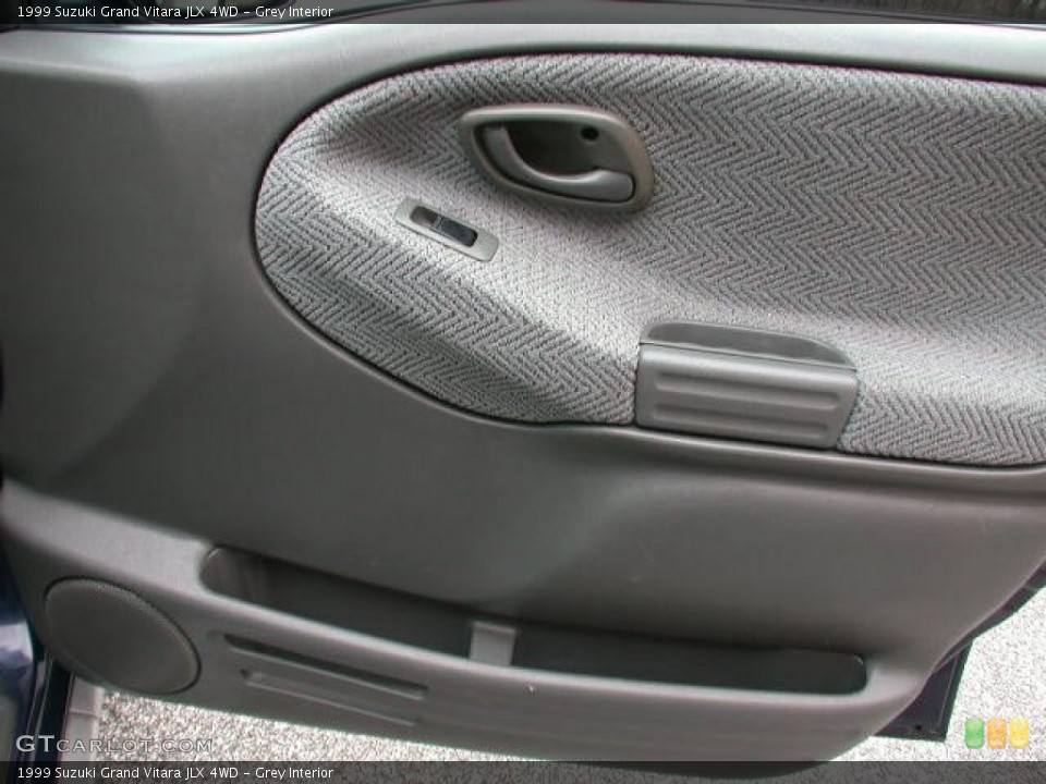 Grey Interior Door Panel for the 1999 Suzuki Grand Vitara JLX 4WD #77500663