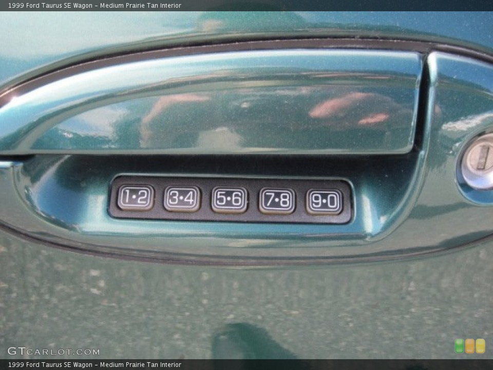 Medium Prairie Tan Interior Controls for the 1999 Ford Taurus SE Wagon #77512778