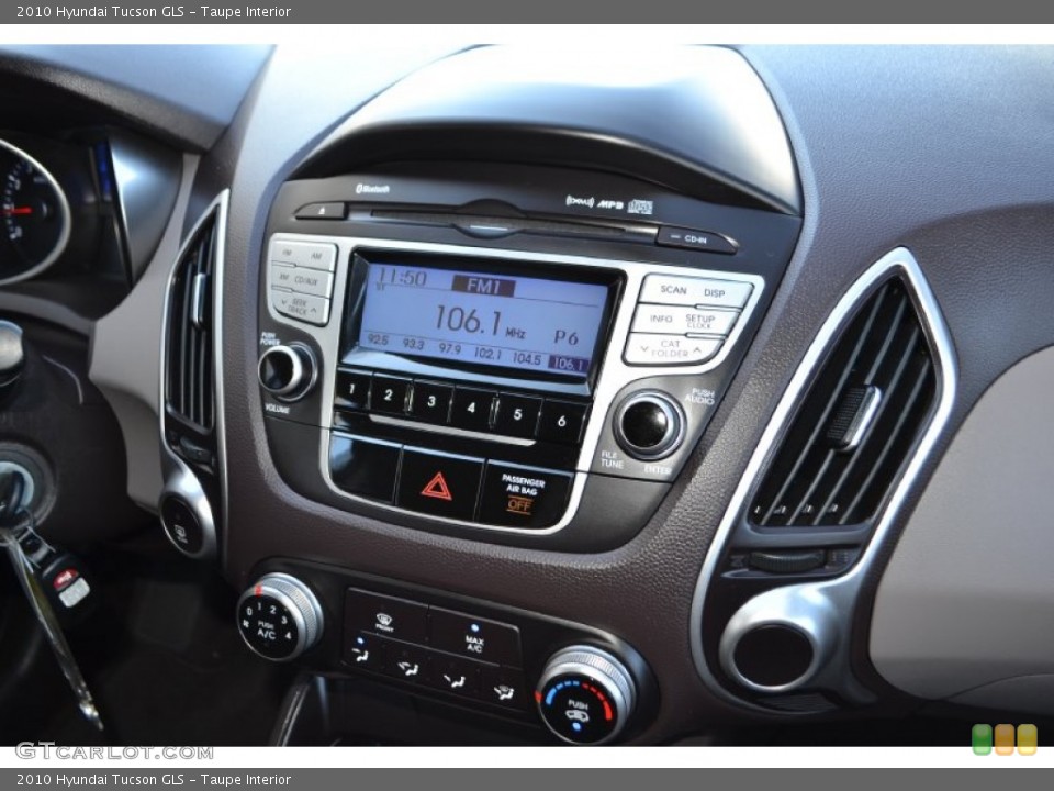 Taupe Interior Controls for the 2010 Hyundai Tucson GLS #77530260