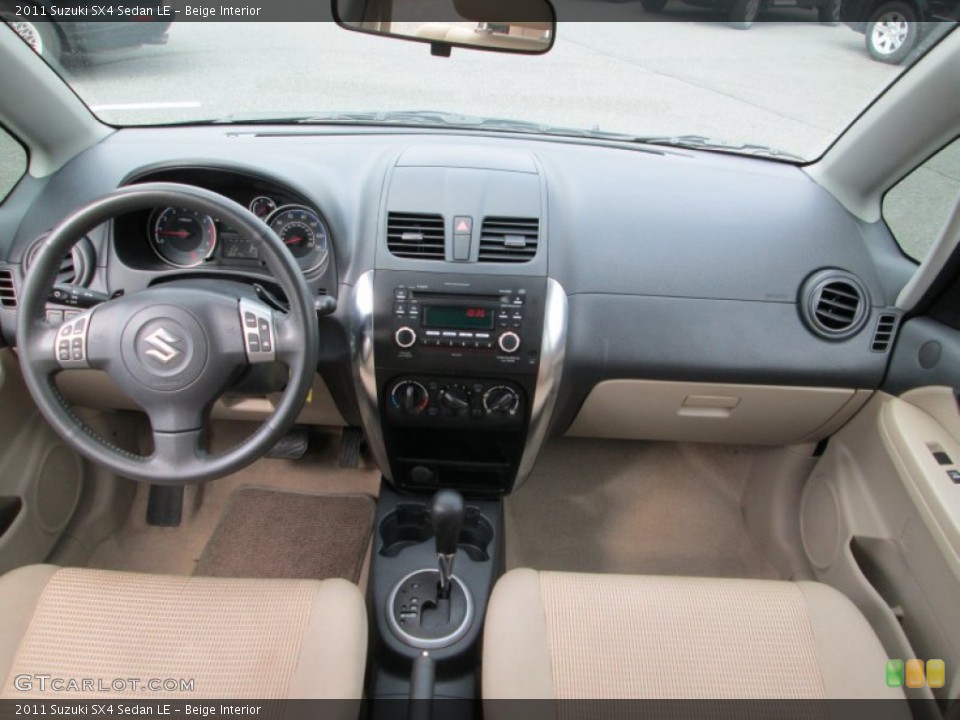 Beige Interior Dashboard for the 2011 Suzuki SX4 Sedan LE #77532662