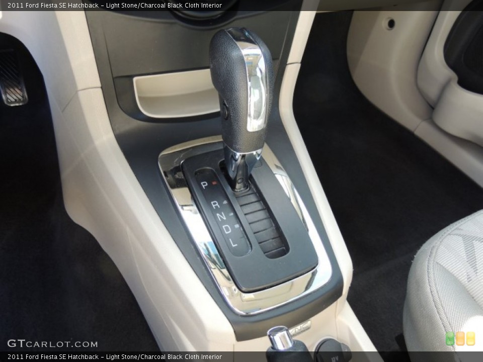 Light Stone/Charcoal Black Cloth Interior Transmission for the 2011 Ford Fiesta SE Hatchback #77551260