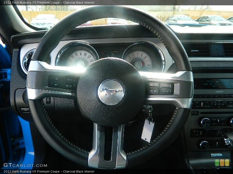 Charcoal Black Interior Steering Wheel for the 2012 Ford Mustang V6 Premium Coupe #77557152