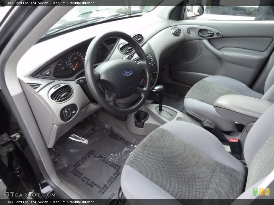 Medium Graphite Interior Prime Interior for the 2004 Ford Focus SE Sedan #77587014