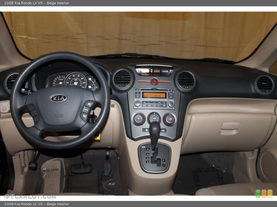 Beige Interior Dashboard for the 2008 Kia Rondo LX V6 #77604771