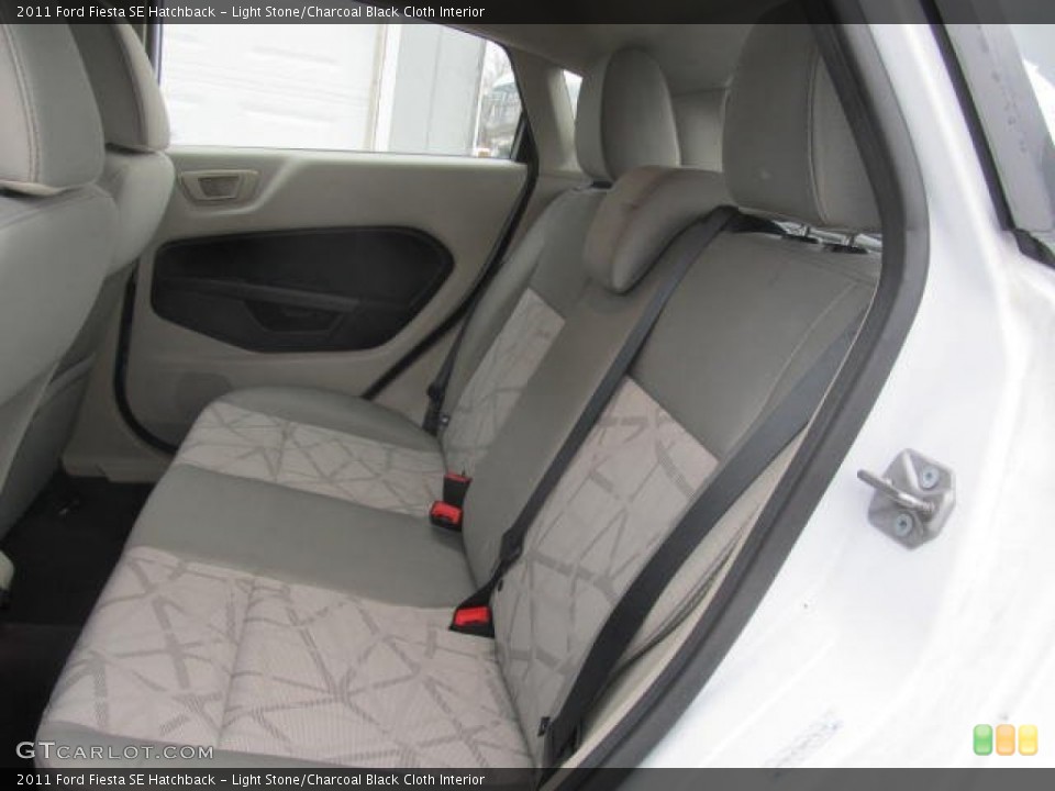 Light Stone/Charcoal Black Cloth Interior Rear Seat for the 2011 Ford Fiesta SE Hatchback #77605150