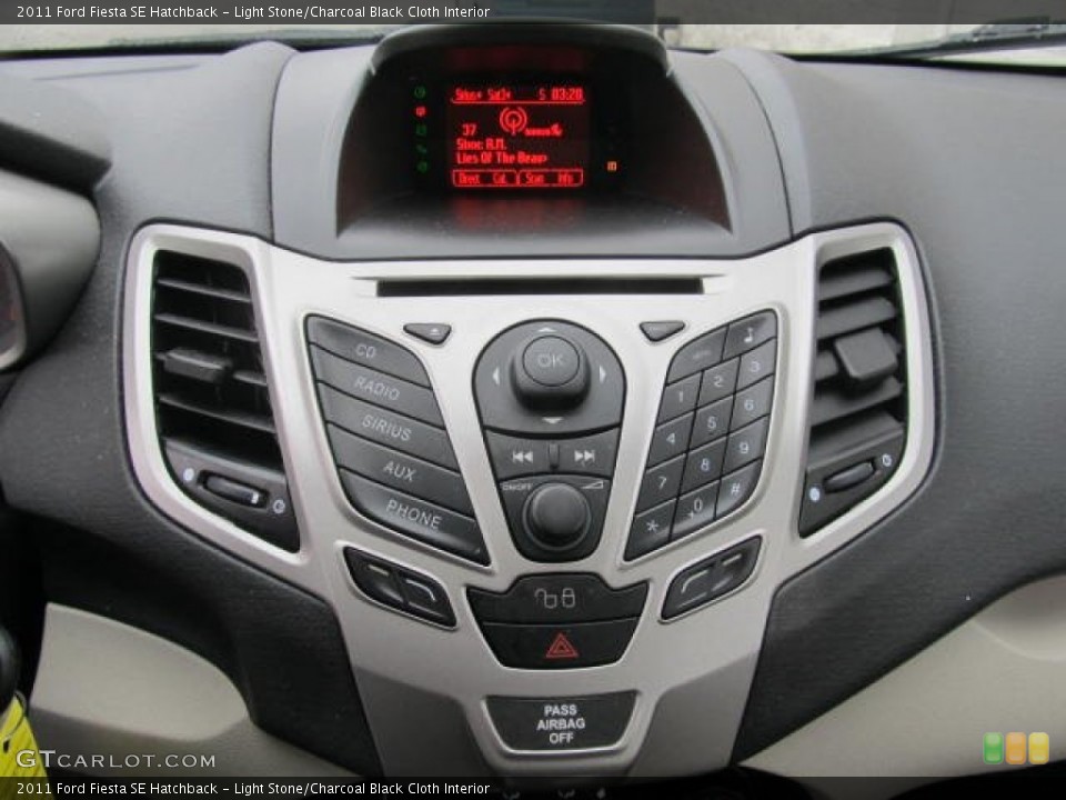 Light Stone/Charcoal Black Cloth Interior Controls for the 2011 Ford Fiesta SE Hatchback #77605179