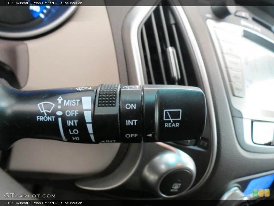 Taupe Interior Controls for the 2012 Hyundai Tucson Limited #77609487