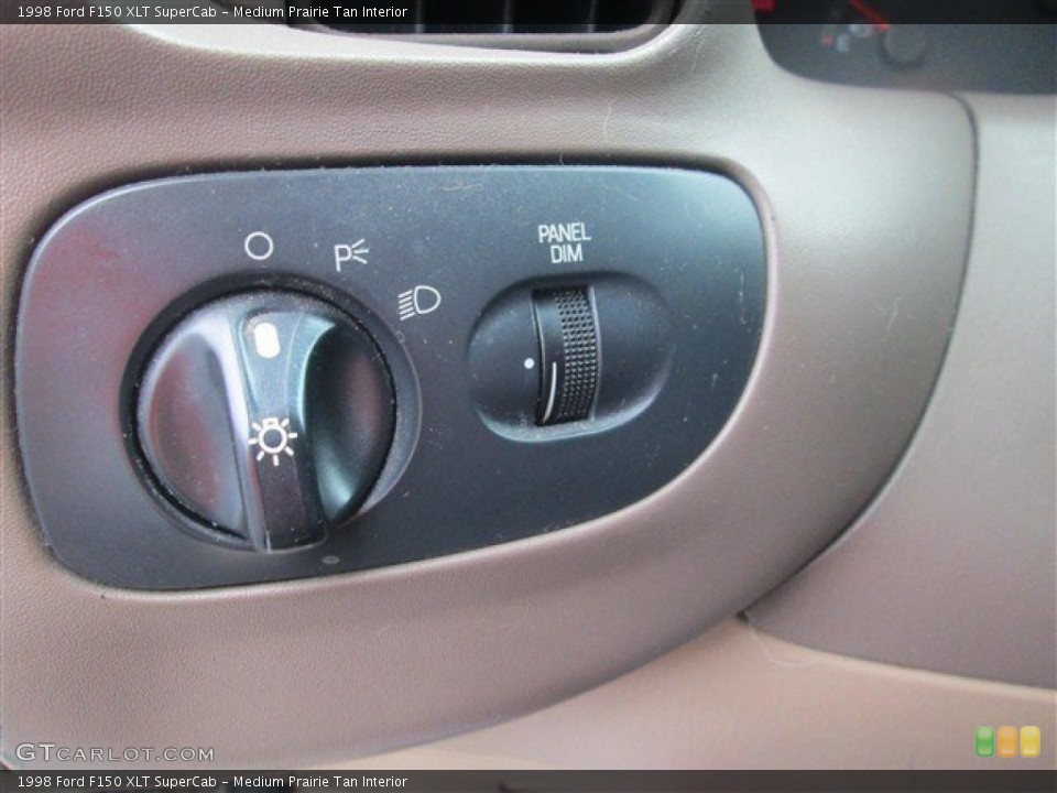 Medium Prairie Tan Interior Controls for the 1998 Ford F150 XLT SuperCab #77633107
