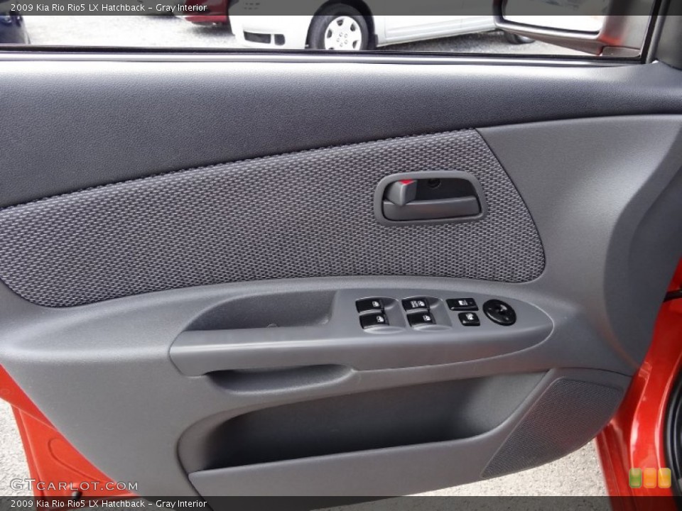 Gray Interior Door Panel for the 2009 Kia Rio Rio5 LX Hatchback #77640438
