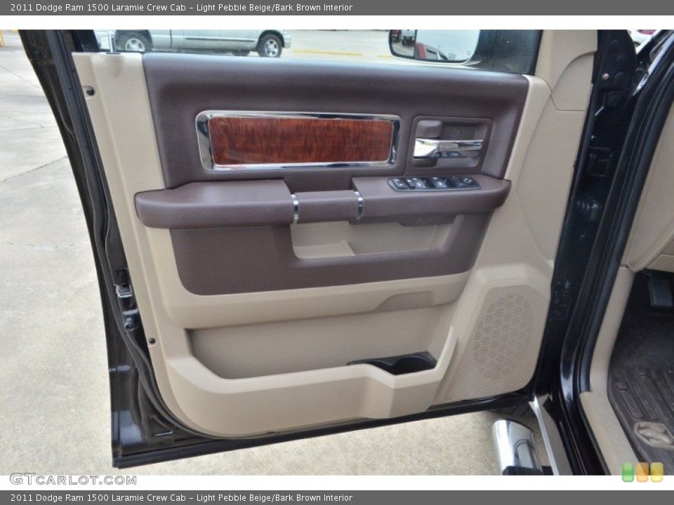 Light Pebble Beige/Bark Brown Interior Door Panel for the 2011 Dodge Ram 1500 Laramie Crew Cab #77646266