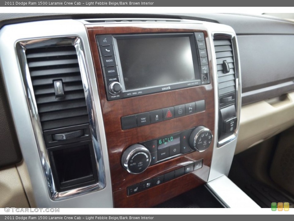 Light Pebble Beige/Bark Brown Interior Controls for the 2011 Dodge Ram 1500 Laramie Crew Cab #77646549