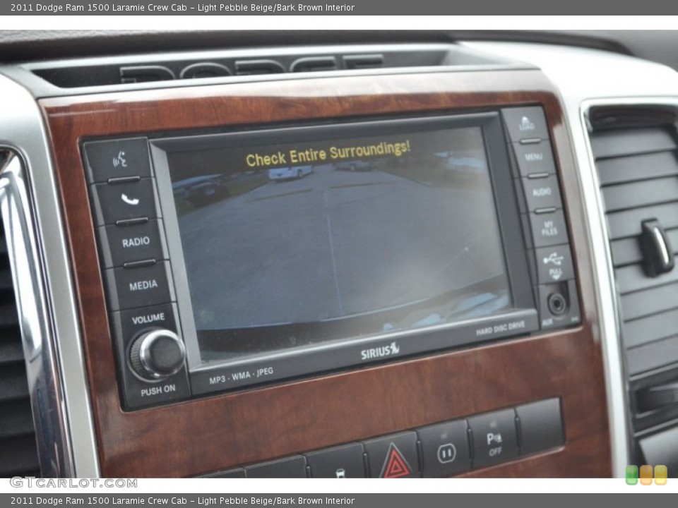 Light Pebble Beige/Bark Brown Interior Controls for the 2011 Dodge Ram 1500 Laramie Crew Cab #77646615