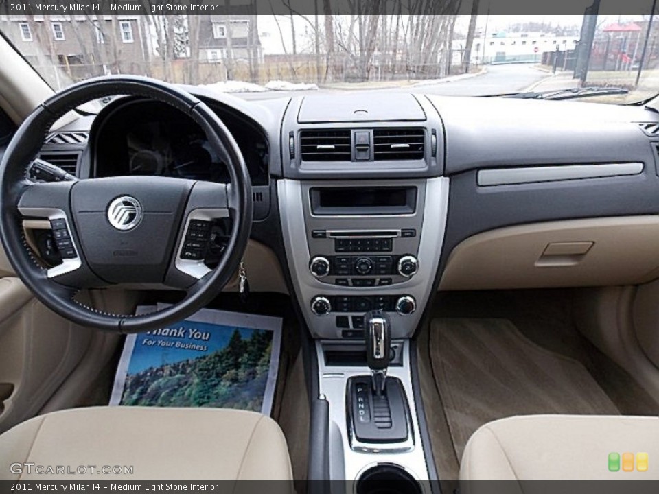 Medium Light Stone Interior Dashboard for the 2011 Mercury Milan I4 #77646828