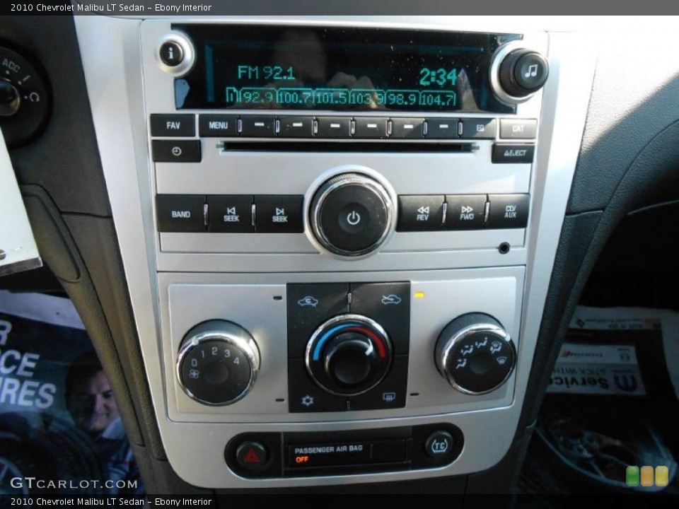 Ebony Interior Controls for the 2010 Chevrolet Malibu LT Sedan #77647638