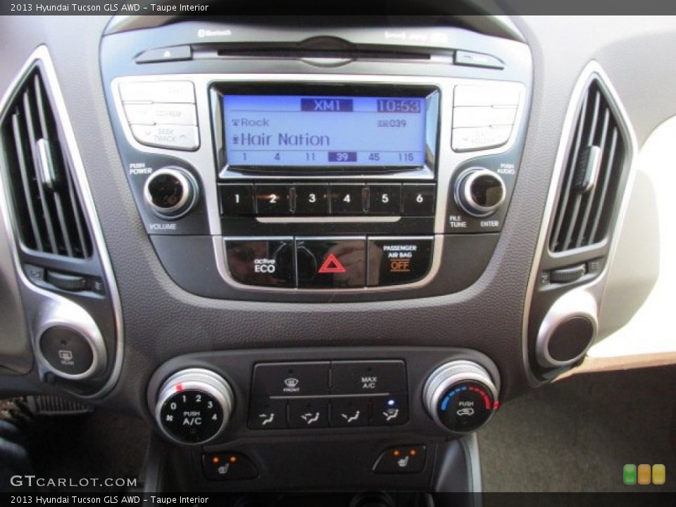 Taupe Interior Controls for the 2013 Hyundai Tucson GLS AWD #77654608
