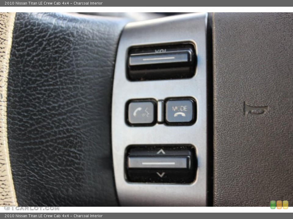 Charcoal Interior Controls for the 2010 Nissan Titan LE Crew Cab 4x4 #77655396