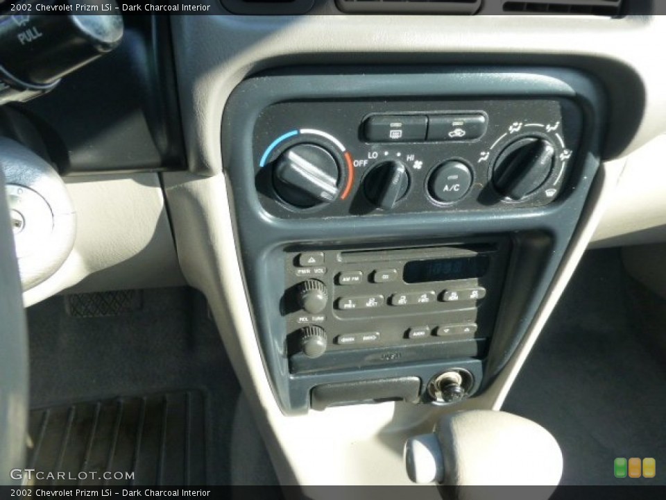 Dark Charcoal Interior Controls for the 2002 Chevrolet Prizm LSi #77661450