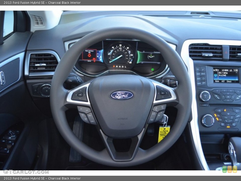 Charcoal Black Interior Steering Wheel for the 2013 Ford Fusion Hybrid SE #77684469