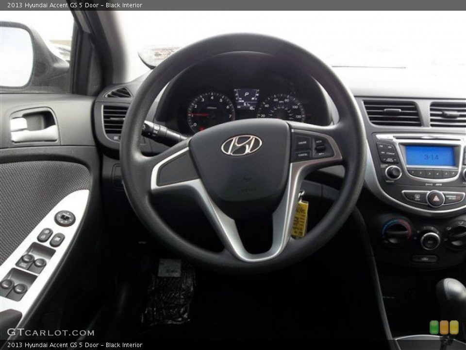 Black Interior Steering Wheel for the 2013 Hyundai Accent GS 5 Door #77695037