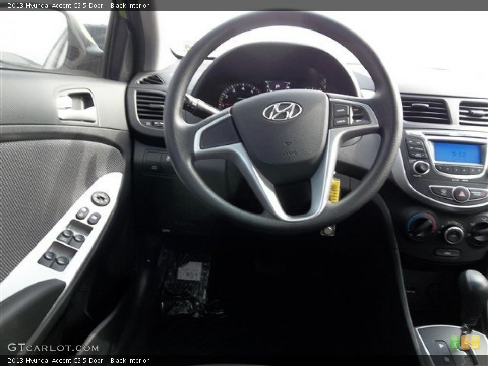 Black Interior Steering Wheel for the 2013 Hyundai Accent GS 5 Door #77695332