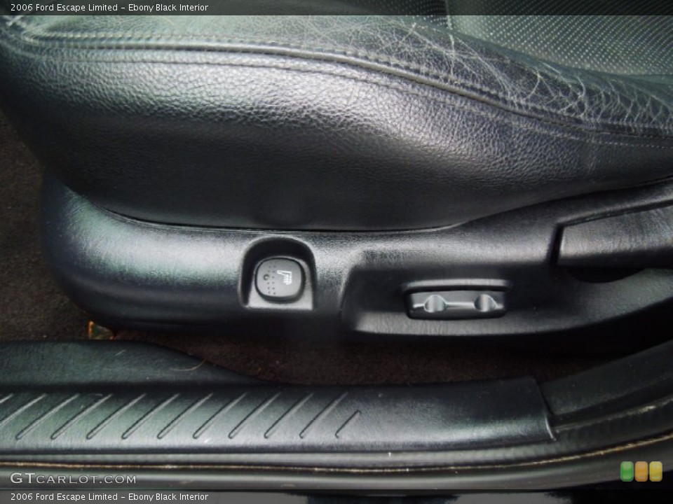 Ebony Black Interior Controls for the 2006 Ford Escape Limited #77695956