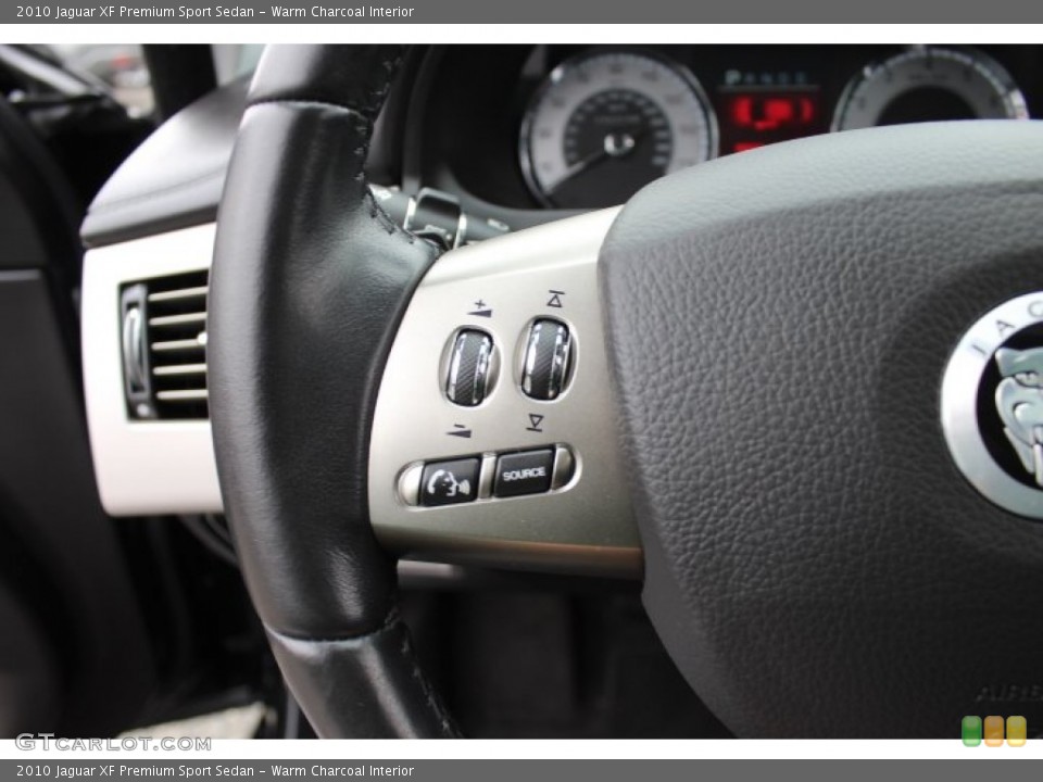 Warm Charcoal Interior Controls for the 2010 Jaguar XF Premium Sport Sedan #77699991