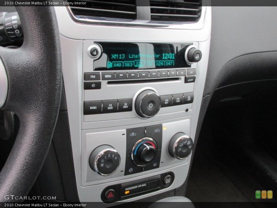 Ebony Interior Controls for the 2010 Chevrolet Malibu LT Sedan #77704437