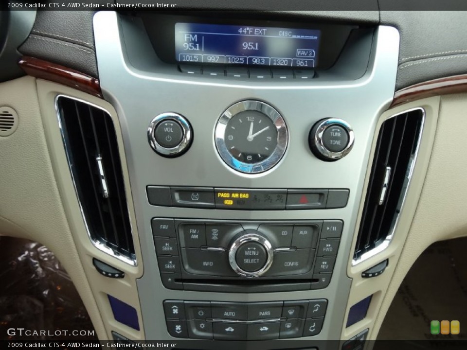 Cashmere/Cocoa Interior Controls for the 2009 Cadillac CTS 4 AWD Sedan #77712753