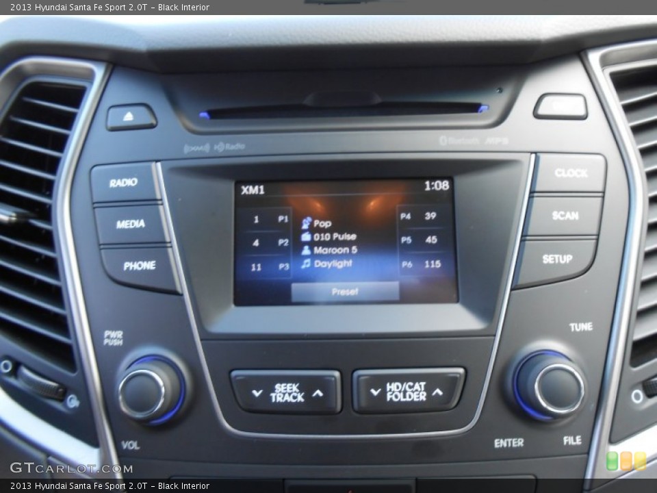 Black Interior Controls for the 2013 Hyundai Santa Fe Sport 2.0T #77715762