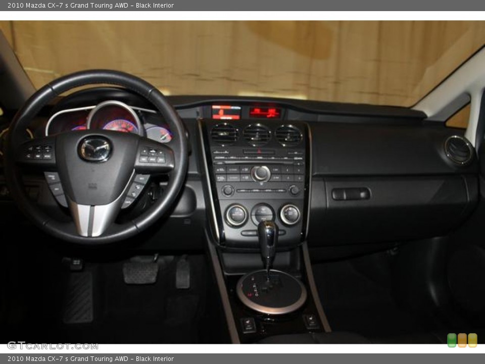 Black Interior Dashboard for the 2010 Mazda CX-7 s Grand Touring AWD #77720346
