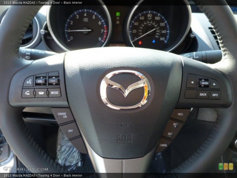 Black Interior Controls for the 2013 Mazda MAZDA3 i Touring 4 Door #77720808