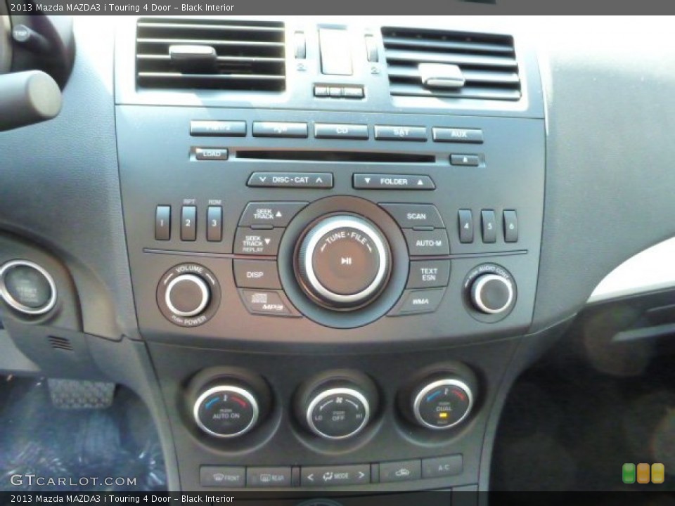 Black Interior Controls for the 2013 Mazda MAZDA3 i Touring 4 Door #77720822