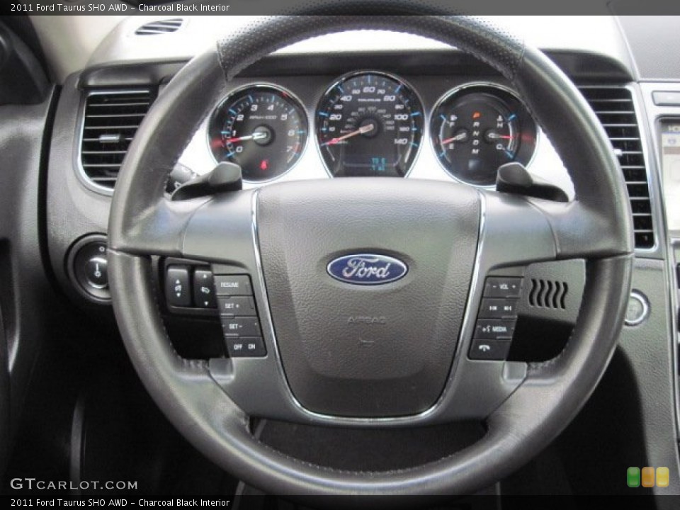 Charcoal Black Interior Steering Wheel for the 2011 Ford Taurus SHO AWD #77730525