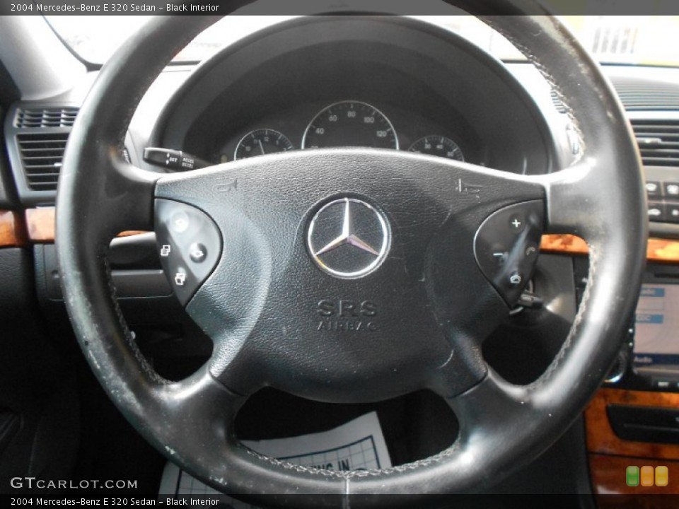 Black Interior Steering Wheel for the 2004 Mercedes-Benz E 320 Sedan #77740514