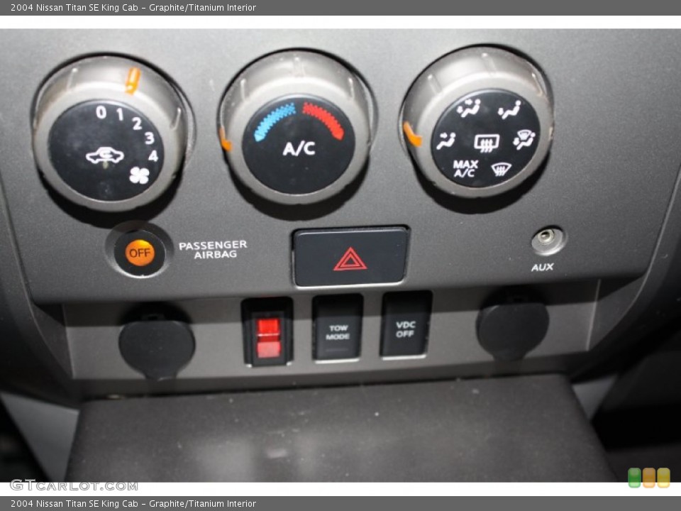 Graphite/Titanium Interior Controls for the 2004 Nissan Titan SE King Cab #77742557