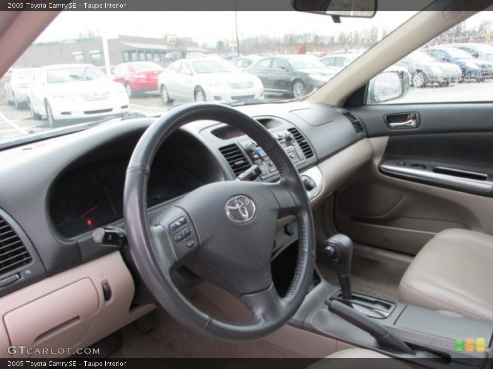 Taupe Interior Dashboard for the 2005 Toyota Camry SE #77743986