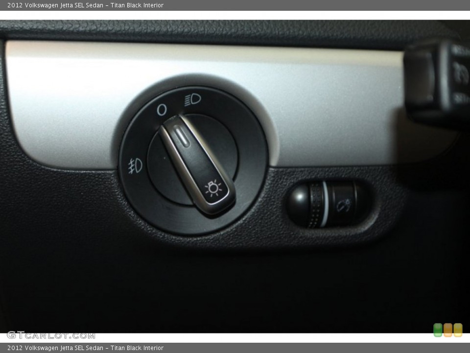 Titan Black Interior Controls for the 2012 Volkswagen Jetta SEL Sedan #77750000
