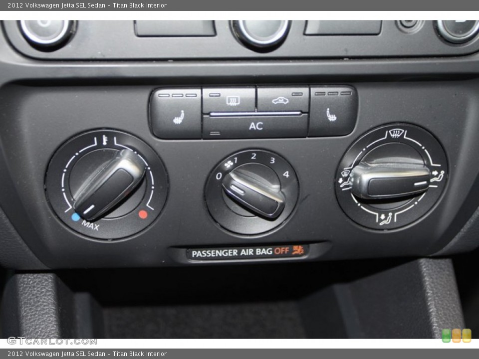 Titan Black Interior Controls for the 2012 Volkswagen Jetta SEL Sedan #77750052