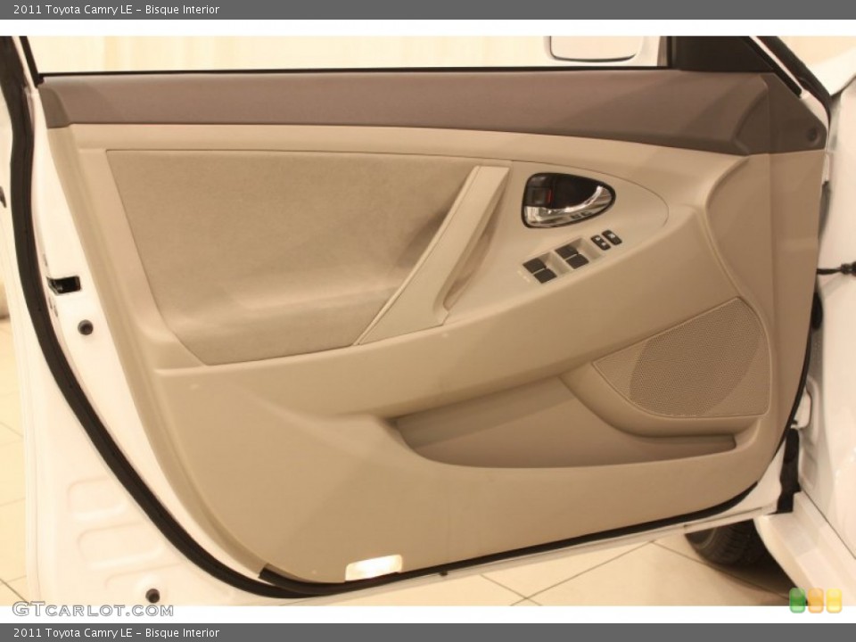 Bisque Interior Door Panel for the 2011 Toyota Camry LE #77754771