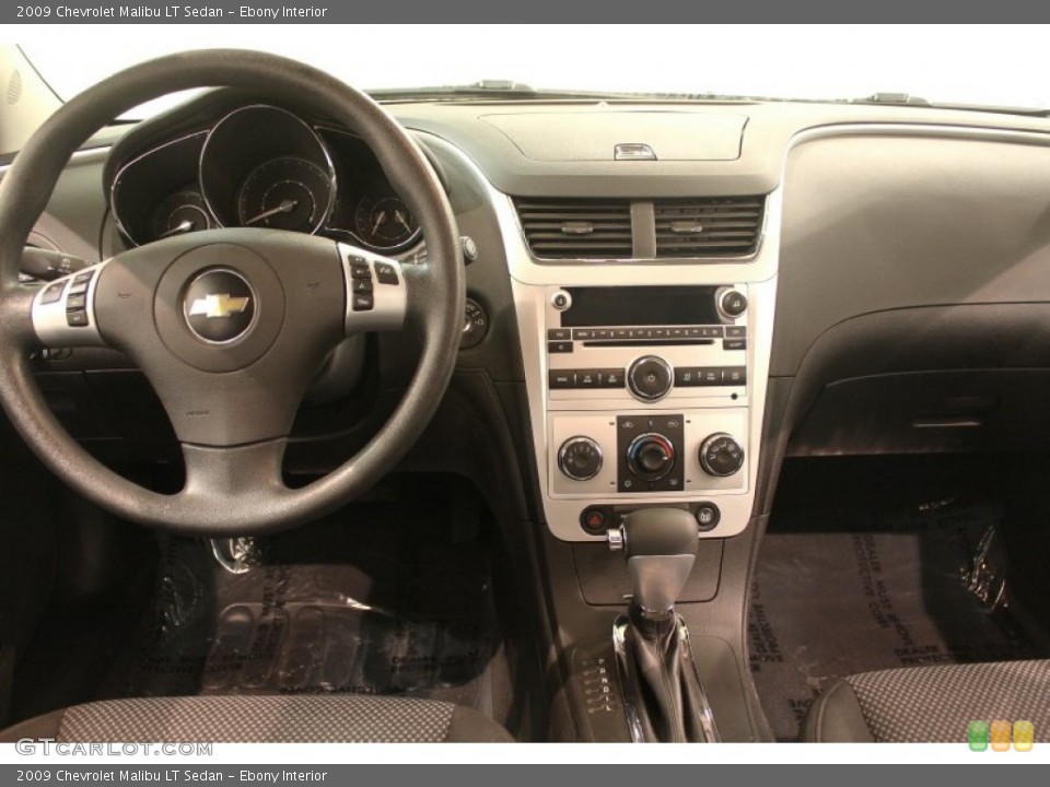 Ebony Interior Dashboard for the 2009 Chevrolet Malibu LT Sedan #77755272