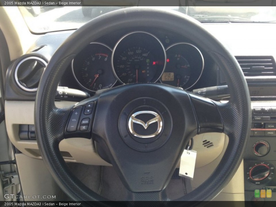 Beige Interior Steering Wheel for the 2005 Mazda MAZDA3 i Sedan #77757034
