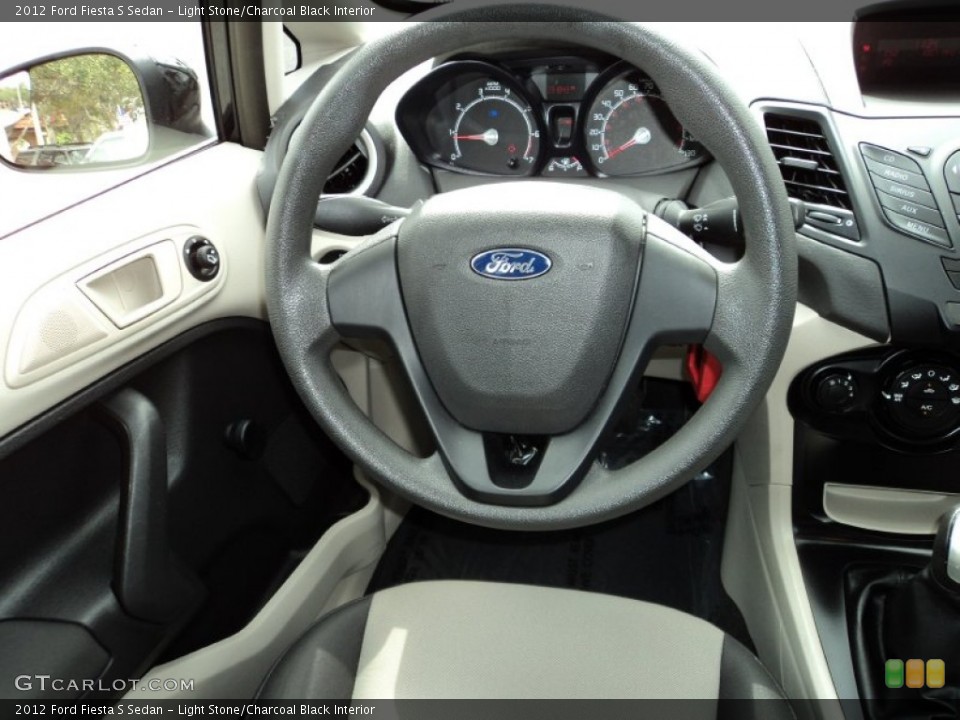 Light Stone/Charcoal Black Interior Steering Wheel for the 2012 Ford Fiesta S Sedan #77757523