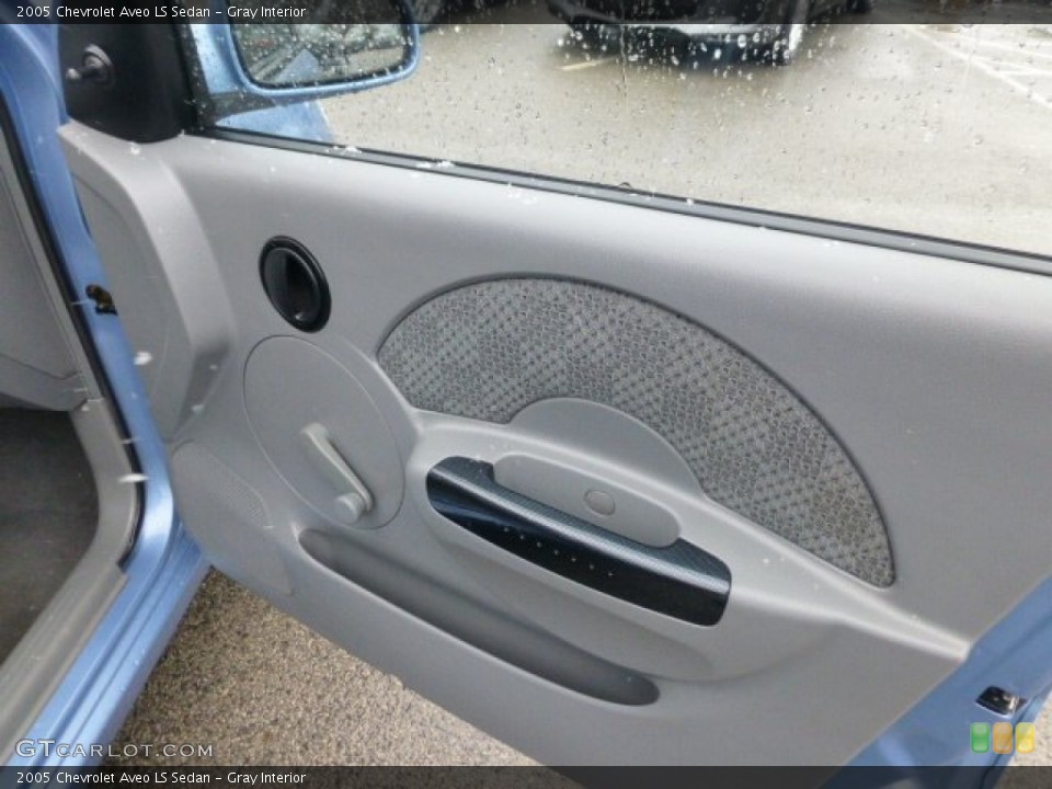 Gray Interior Door Panel for the 2005 Chevrolet Aveo LS Sedan #77764127