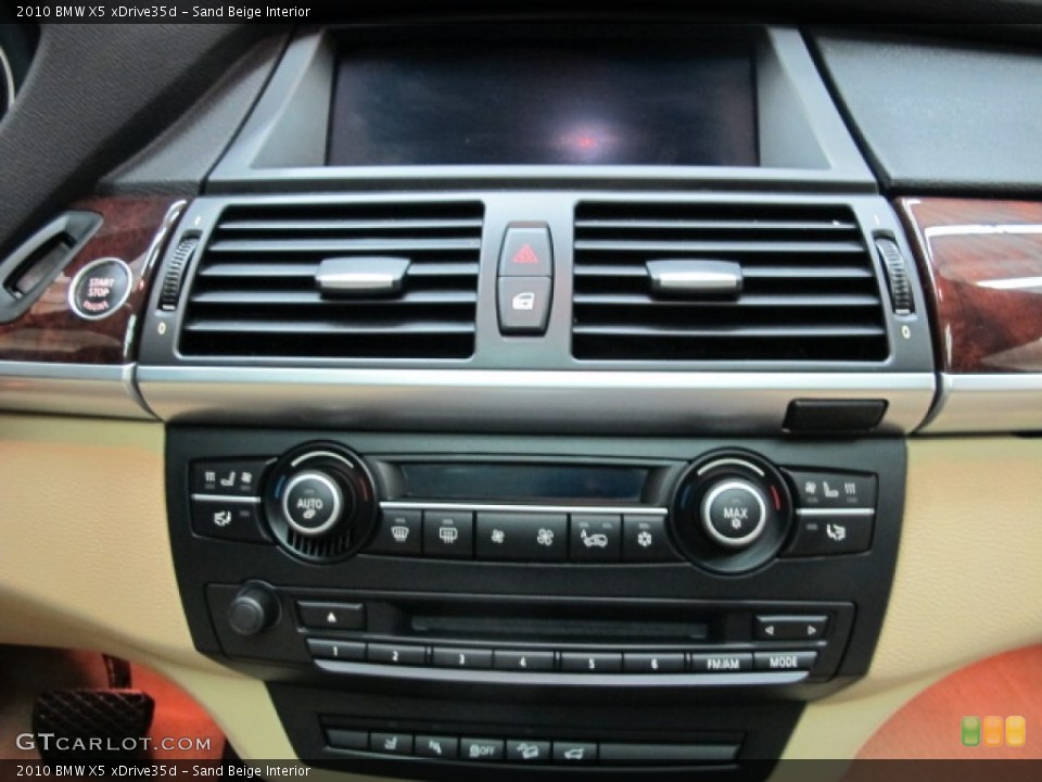 Sand Beige Interior Controls for the 2010 BMW X5 xDrive35d #77768653