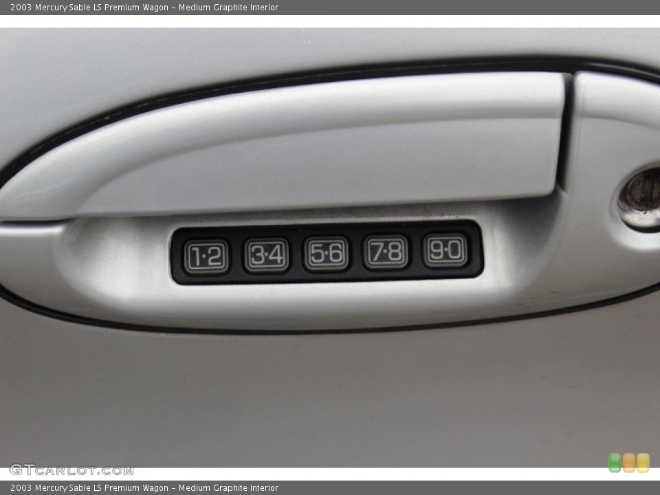Medium Graphite Interior Controls for the 2003 Mercury Sable LS Premium Wagon #77781920