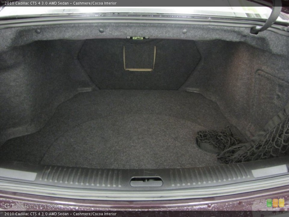 Cashmere/Cocoa Interior Trunk for the 2010 Cadillac CTS 4 3.0 AWD Sedan #77801066