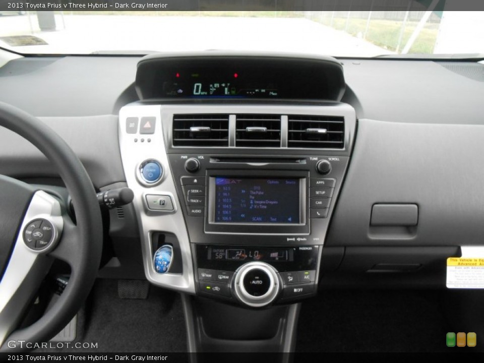 Dark Gray Interior Controls for the 2013 Toyota Prius v Three Hybrid #77803514