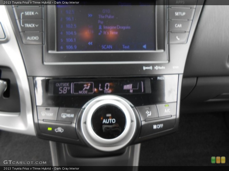 Dark Gray Interior Controls for the 2013 Toyota Prius v Three Hybrid #77803556