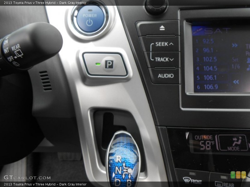 Dark Gray Interior Controls for the 2013 Toyota Prius v Three Hybrid #77803592