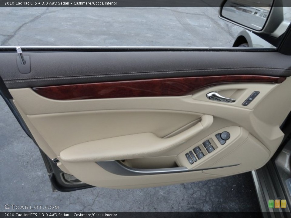 Cashmere/Cocoa Interior Door Panel for the 2010 Cadillac CTS 4 3.0 AWD Sedan #77808191